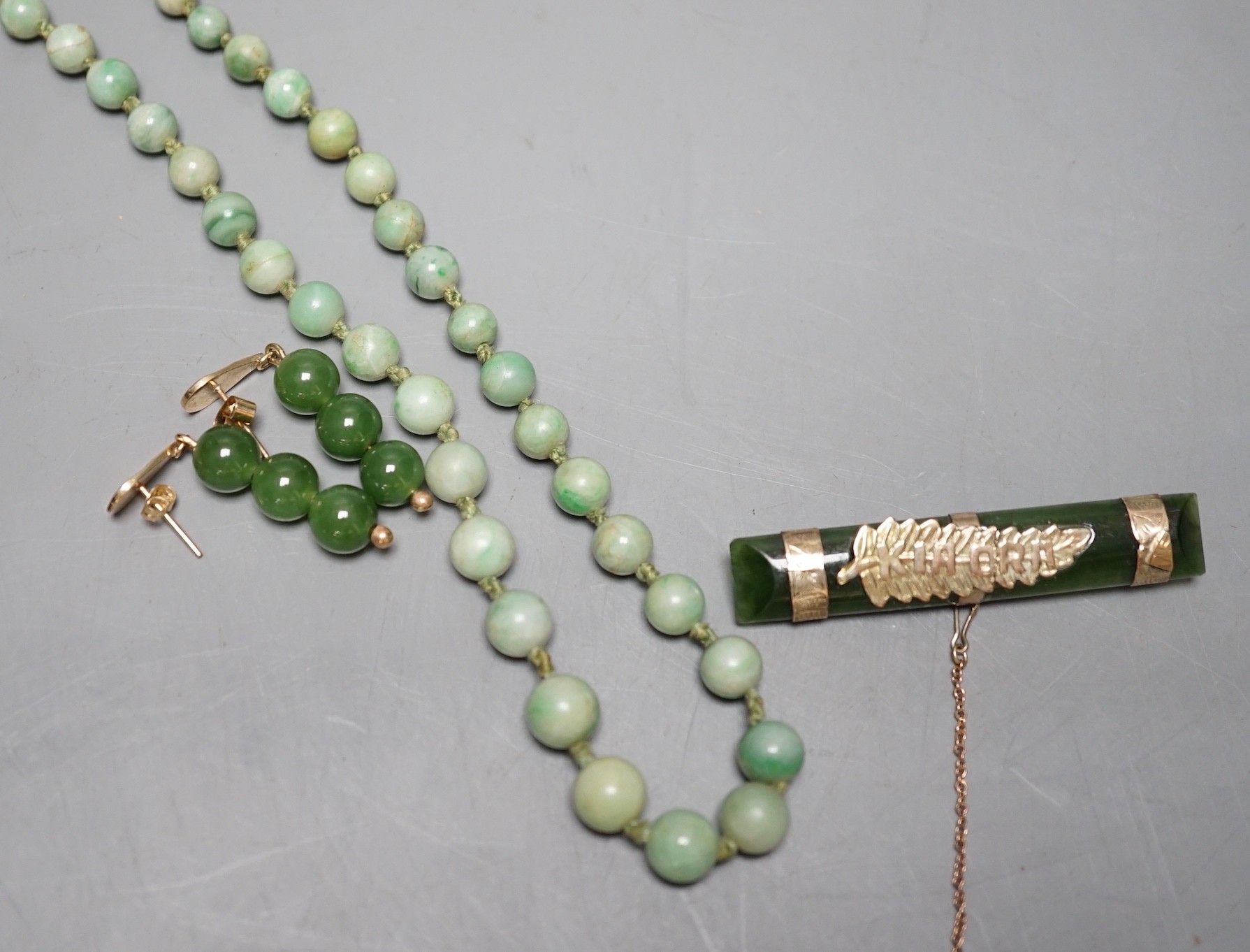 A jade bead necklace, together with a painted pearl pendant and other jade items